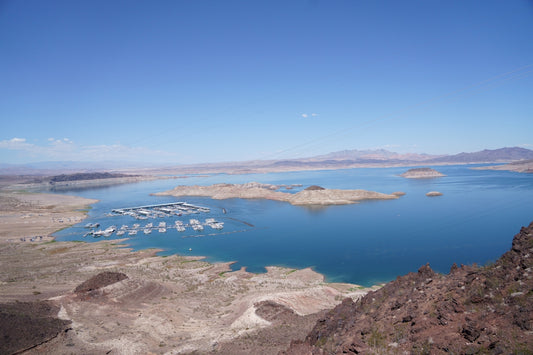 a body of water surrounded by land with Lake Mead in the background